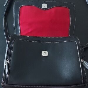 Elegant Black Crossbody Bag with Red Interior